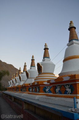 Chortens lined outside the Monastery