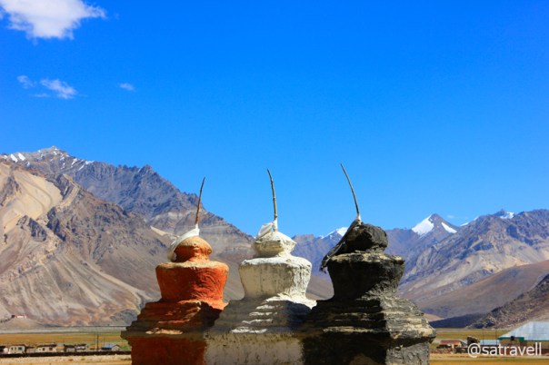 Entrance to Rangdum Valley by tri-colour chortens; the tri-colour – Black, White, Red (Ochre) – on chortens in trans-Himalayas symbolize a worldview – underworld, sky, earth – much older than Buddhism itself.