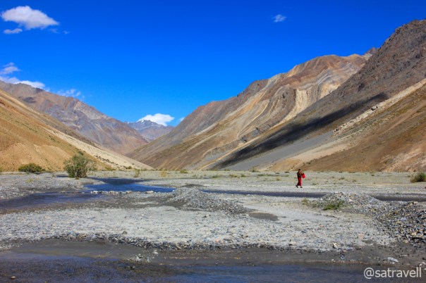 A monk collecting water from Kanji nala