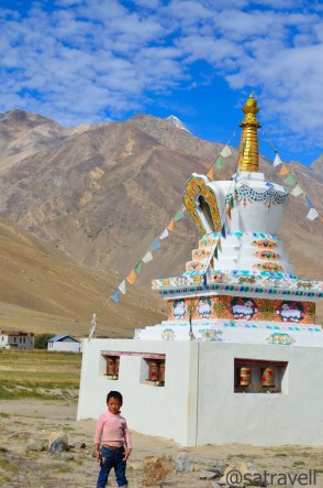 A Tibetan chorten at Sani; Also a kid (desperately wanted me to take his photo) in the foreground