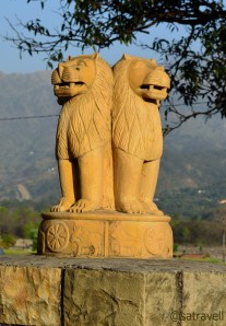 Ashoka Pillars guarding the entrance