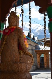 A recently installed statue of Buddha overlooks the Kamakhya Temple courtyard at Kamru 