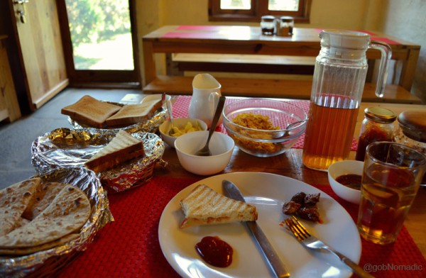 At the breakfast table; washed down with plentiful of fresh Apple Juice