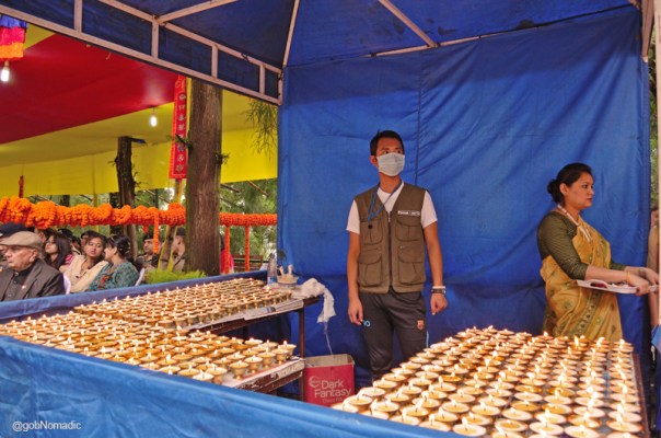 Votive metalled butter-lamps at the venue