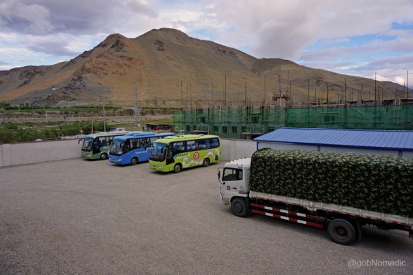 At the Kangmar residential complex; our vehicles and the luggage truck