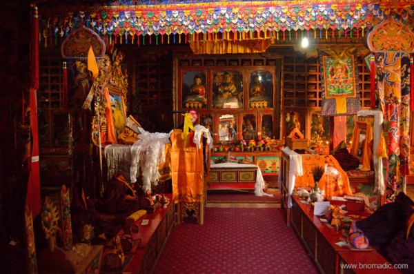 The central three figures in the ornate dukhang are Dusum Sangye, the Buddhas of the Three Times. Many of the small statues here were originally at Shepeling. 