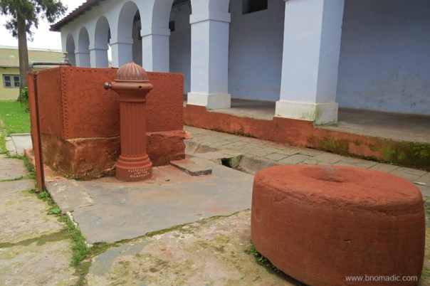 A Standpost Hydrant, antique Scottish Water Pump in the compound