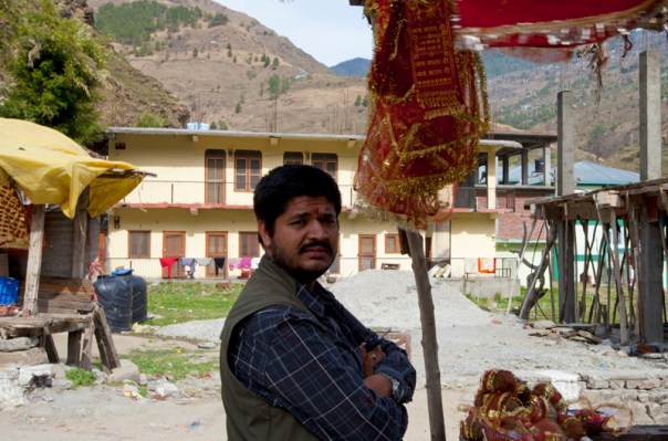 Yours truly lined up at the prasad shop outside the temple complex